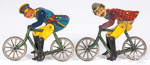 TWO TIN LITHOGRAPH GILBERT CYCLIST