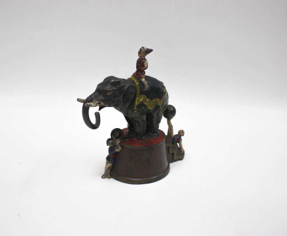 CAST IRON MECHANICAL BANK HAVING 314075