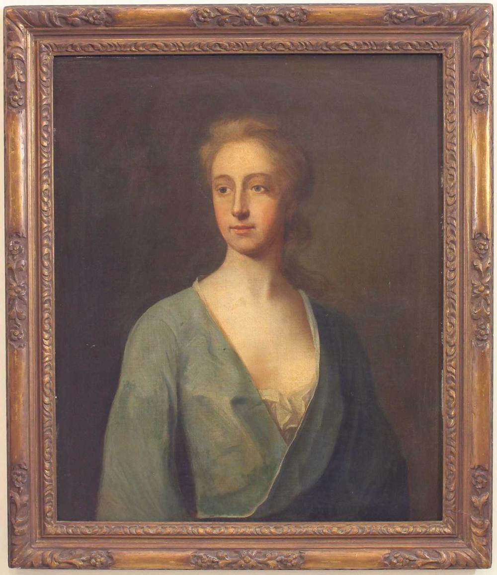 PORTRAIT OF A WOMAN IN A GREEN