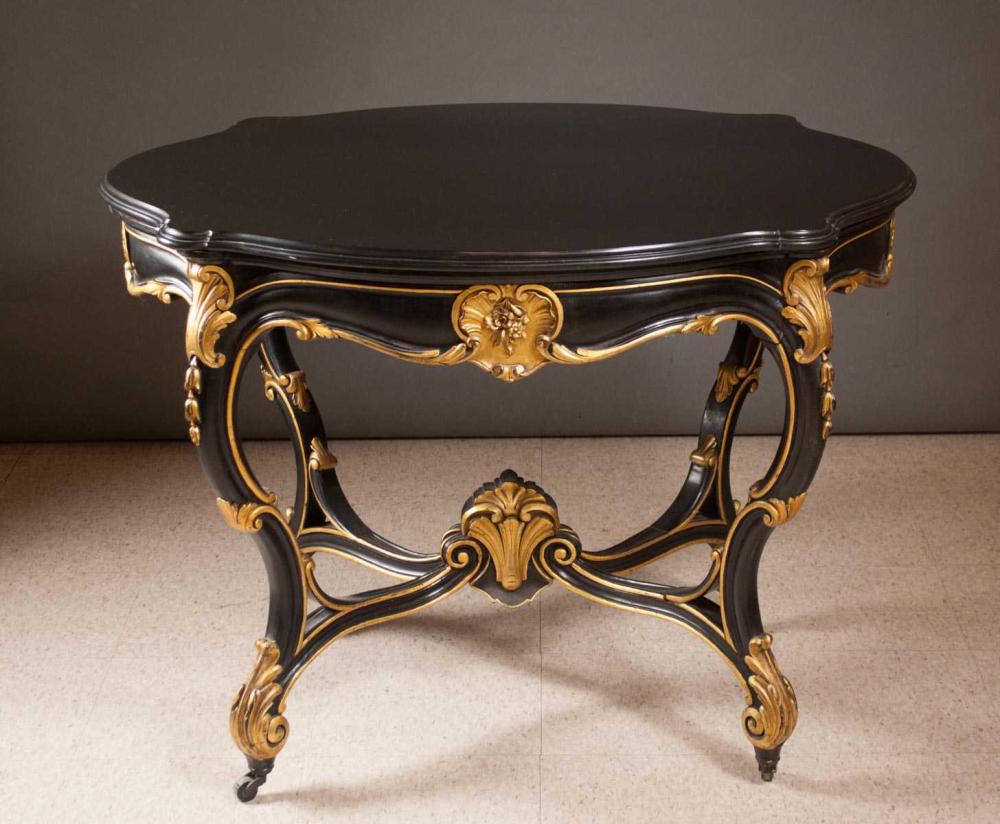 VICTORIAN EBONIZED AND PARCEL-GILT