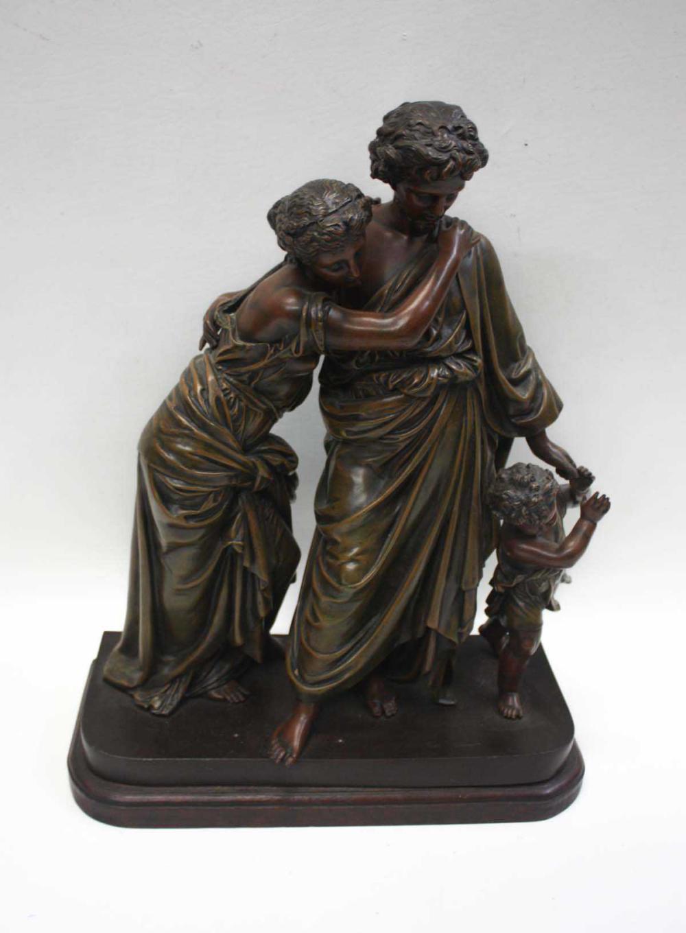 A BRONZED SPELTER PATINATED FIGURAL