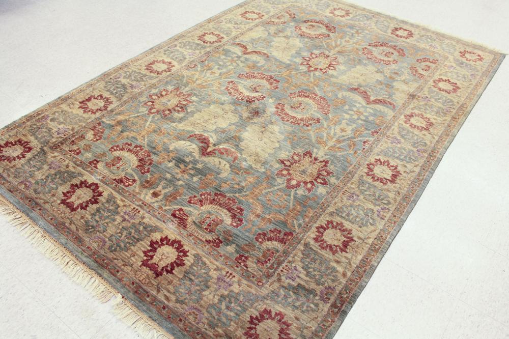 A CONTEMPORARY HAND KNOTTED ORIENTAL