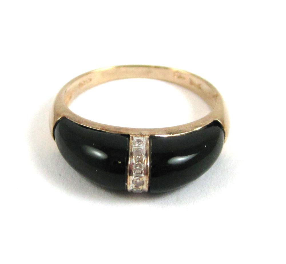 DIAMOND, BLACK ONYX AND FOURTEEN KARAT