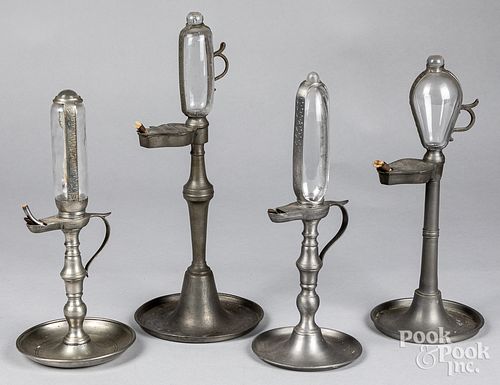 FOUR PEWTER WHALE OIL CLOCK LAMPS,