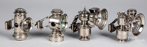 FOUR BICYCLE LAMPS, CA. 1900Four