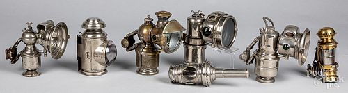 SEVEN BICYCLE LAMPS, CA. 1900Seven bicycle