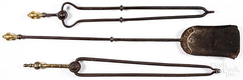 THREE BRASS AND IRON FIRE TOOLS,