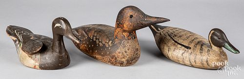 THREE CARVED AND PAINTED DUCK DECOYS,