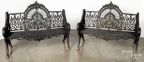 PAIR OF CAST IRON GARDEN BENCHES,