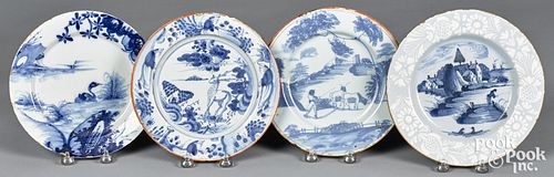 FOUR DELFT BLUE AND WHITE PLATES,