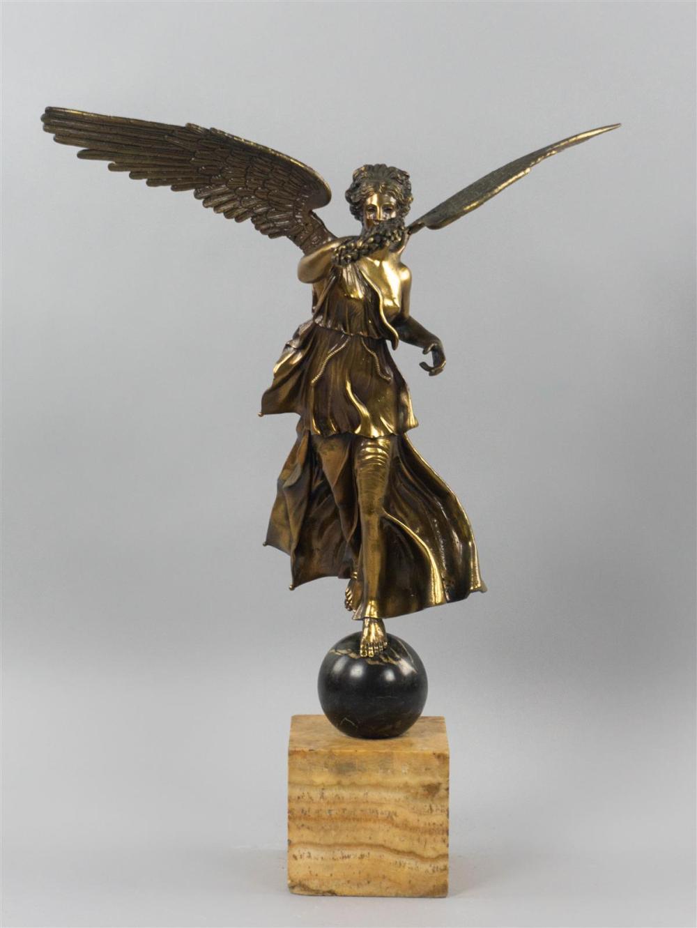 GILT-BRONZE OR BRASS FIGURE OF WINGED