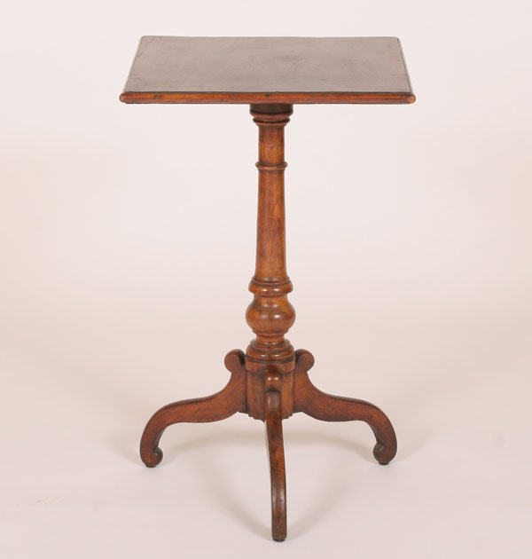 Early American tripod candlestand; carved