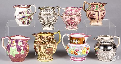 EIGHT LUSTRE PITCHERS, 19TH C.Eight