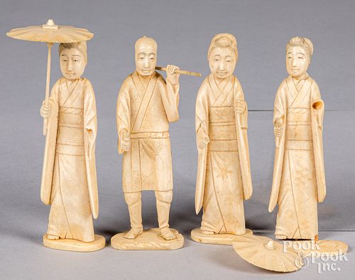 FOUR JAPANESE CARVED IVORY FIGURES,