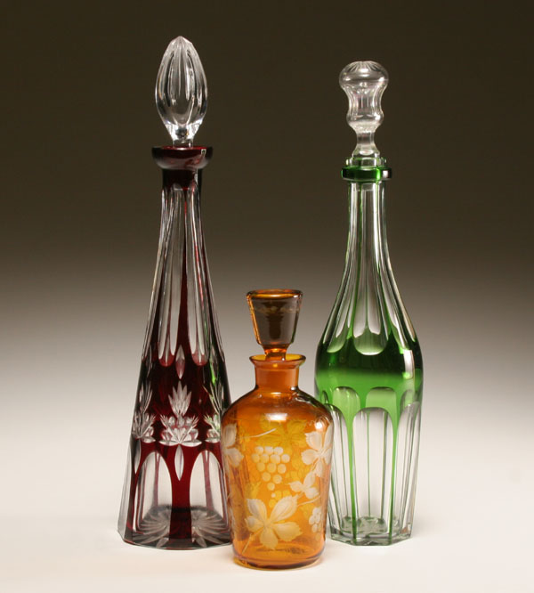 Three Bohemian cut to clear glass decanters