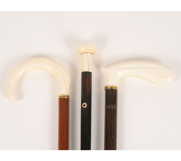 Three canes with curved and rounded