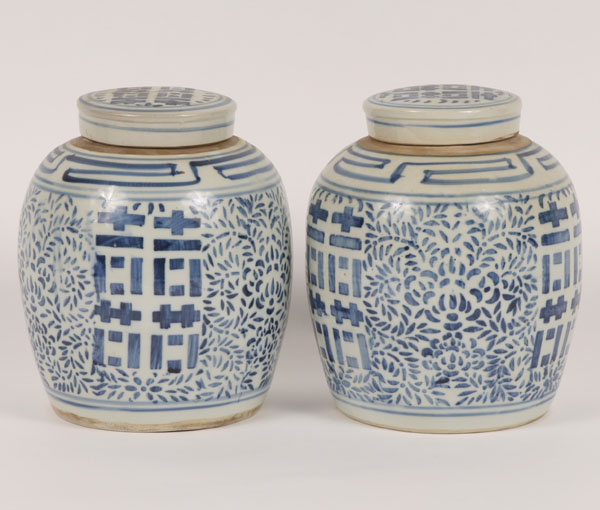 A pair of Chinese ceramic lidded