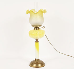 Victorian oil lamp; yellow tinted shade