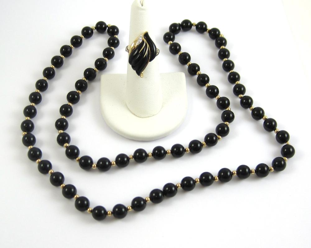 TWO ARTICLES OF BLACK ONYX JEWELRY,