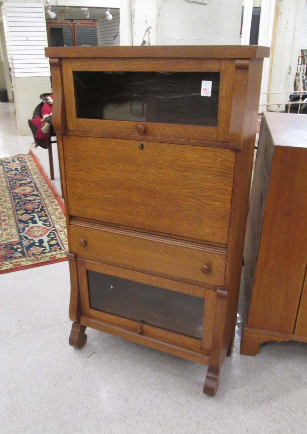 AN OAK DROP FRONT SECRETARY BOOKCASE  315be5