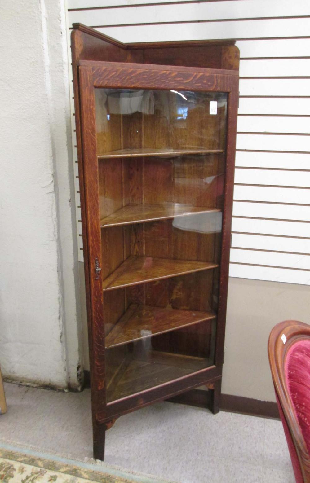 AN OAK CORNER CHINA CABINET, AMERICAN,