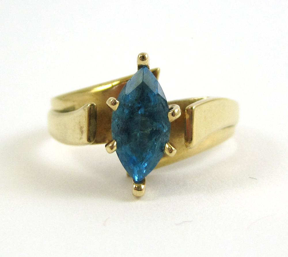 BLUE TOPAZ AND FOURTEEN KARAT GOLD