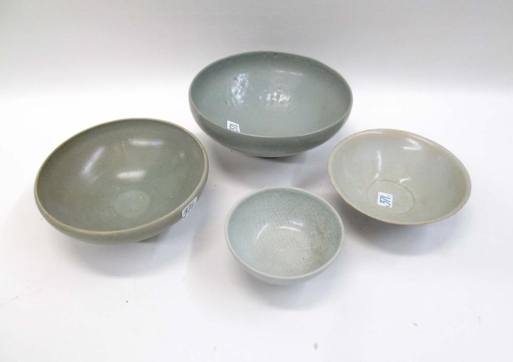 FOUR CHINESE GREENWARE POTTERY BOWLS,