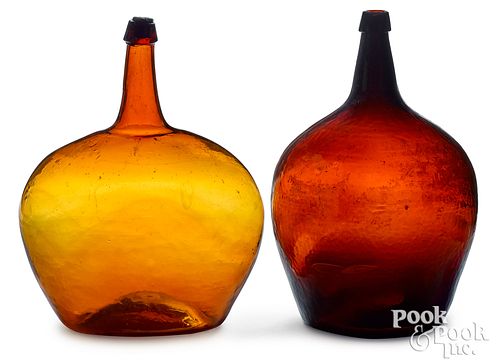 TWO AMBER GLASS DEMIJOHNS, 19"