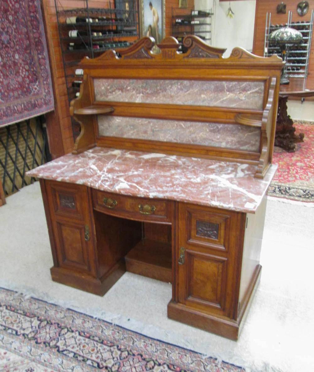 A VICTORIAN MARBLE-TOP WALNUT DRESSER,