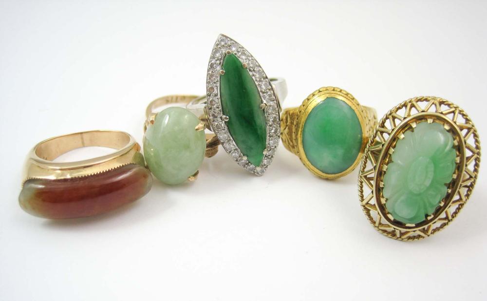 COLLECTION OF FIVE JADE AND GOLD 3160a1