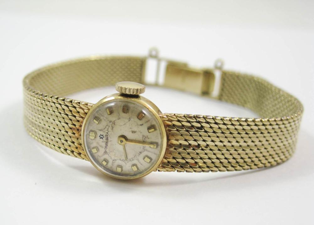 LADYS FOURTEEN KARAT GOLD WRIST WATCH,