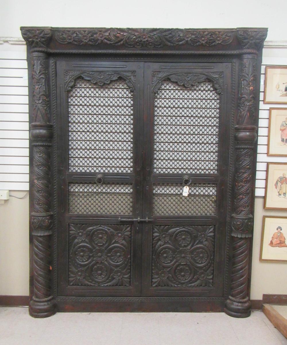 HIGHLY CARVED TEAK AND IRON DOORWAY  316109