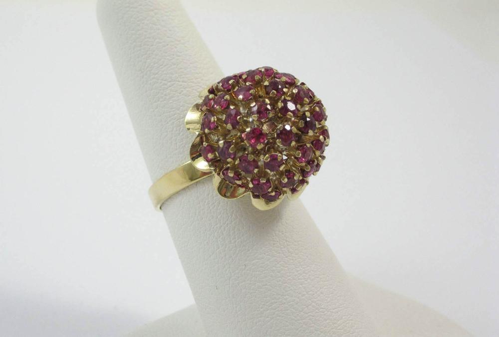 RUBY AND FOURTEEN KARAT GOLD DOME