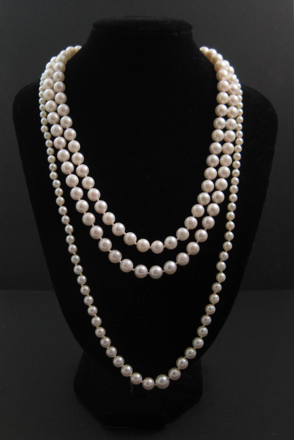 TWO SINGLE STRAND WHITE PEARL NECKLACES,