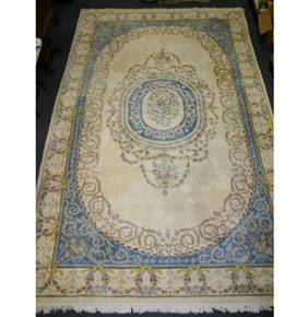 Plush room size area rug with tapestry