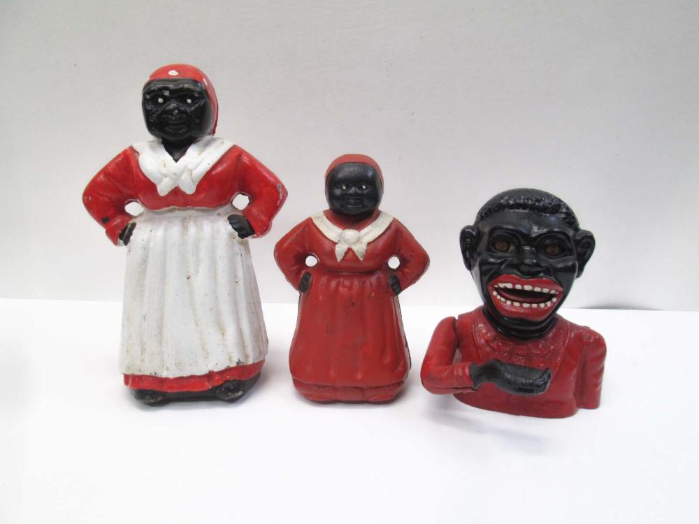 THREE "BLACK" FIGURAL CAST IRON