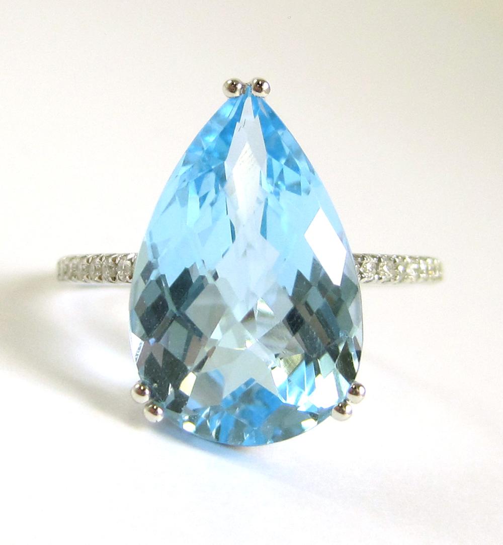 BLUE TOPAZ, DIAMOND AND FOURTEEN