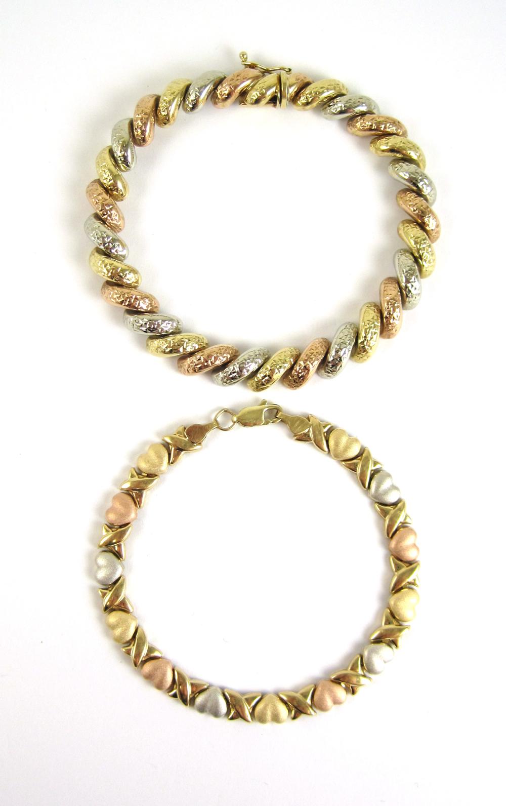 TWO THREE TONE GOLD LINK BRACELETS  3165f3