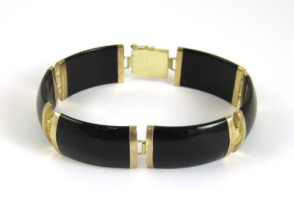 BLACK ONYX AND FOURTEEN KARAT GOLD 31668c