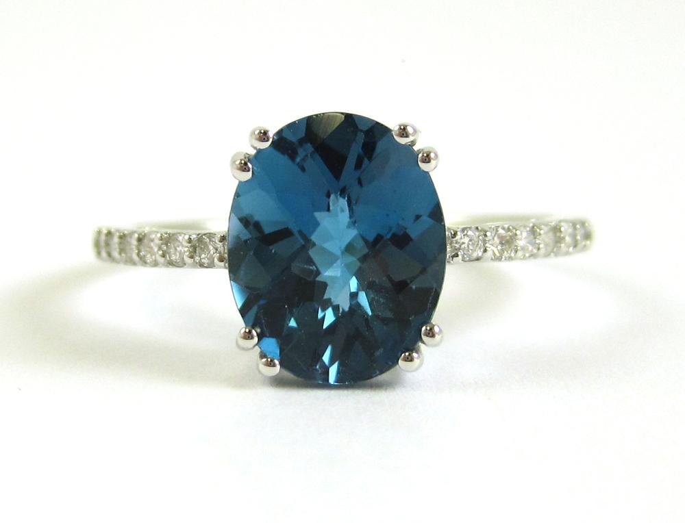 BLUE TOPAZ, DIAMOND AND FOURTEEN