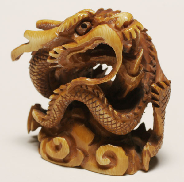 Japanese ivory netsuke serpent/dragon;