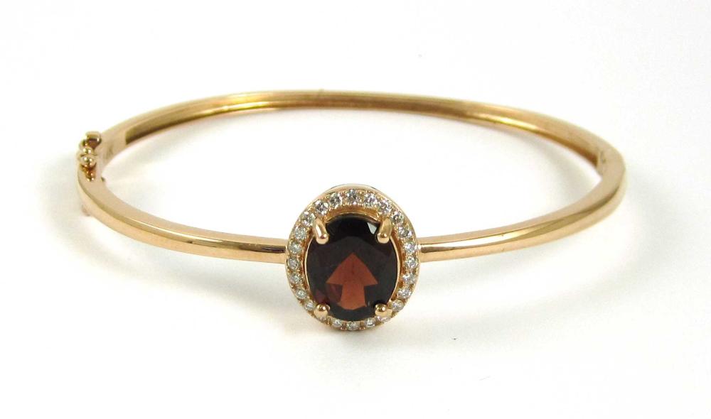 GARNET, DIAMOND AND ROSE GOLD BANGLE.