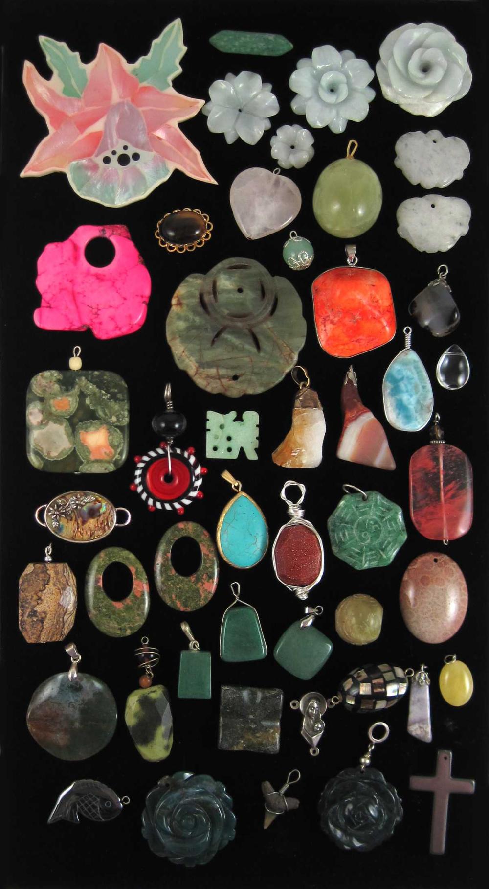 FOURTY EIGHT PENDANTS BEADS AND 316a71