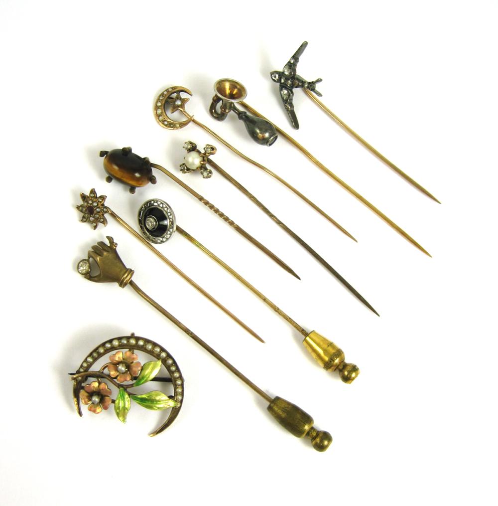 COLLECTION OF EIGHT STICK PINS