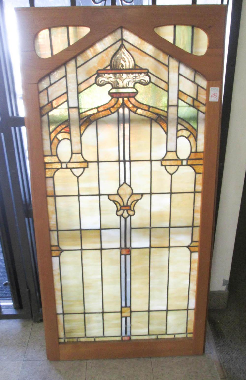 A PAIR OF STAINED AND LEADED GLASS 316c29