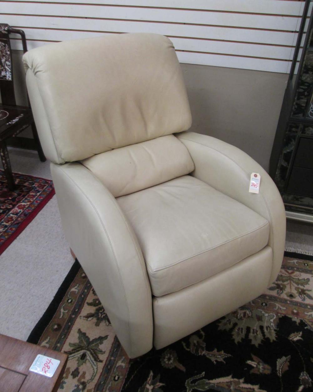 A CONTEMPORARY IVORY LEATHER RECLINER,