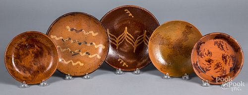 FIVE REDWARE PLATES AND SHALLOW
