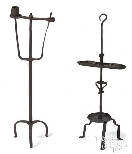 TWO ADJUSTABLE WROUGHT IRON CANDLESTANDS  314a02