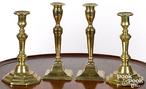 TWO PAIRS OF BRASS CANDLESTICKS,