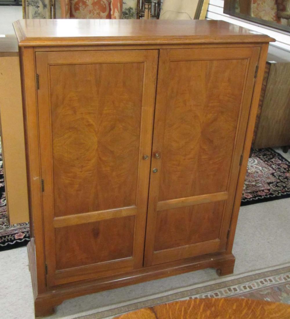 TWO-DOOR WALNUT CABINET, AMERICAN, C.